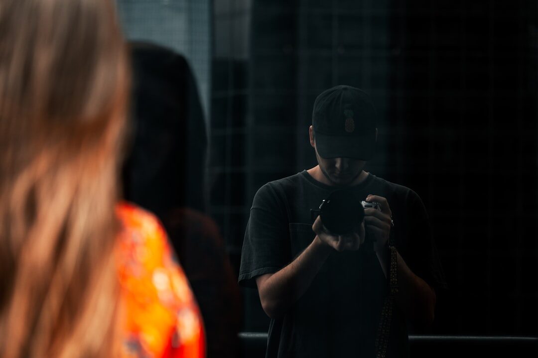 person reflecting in mirror