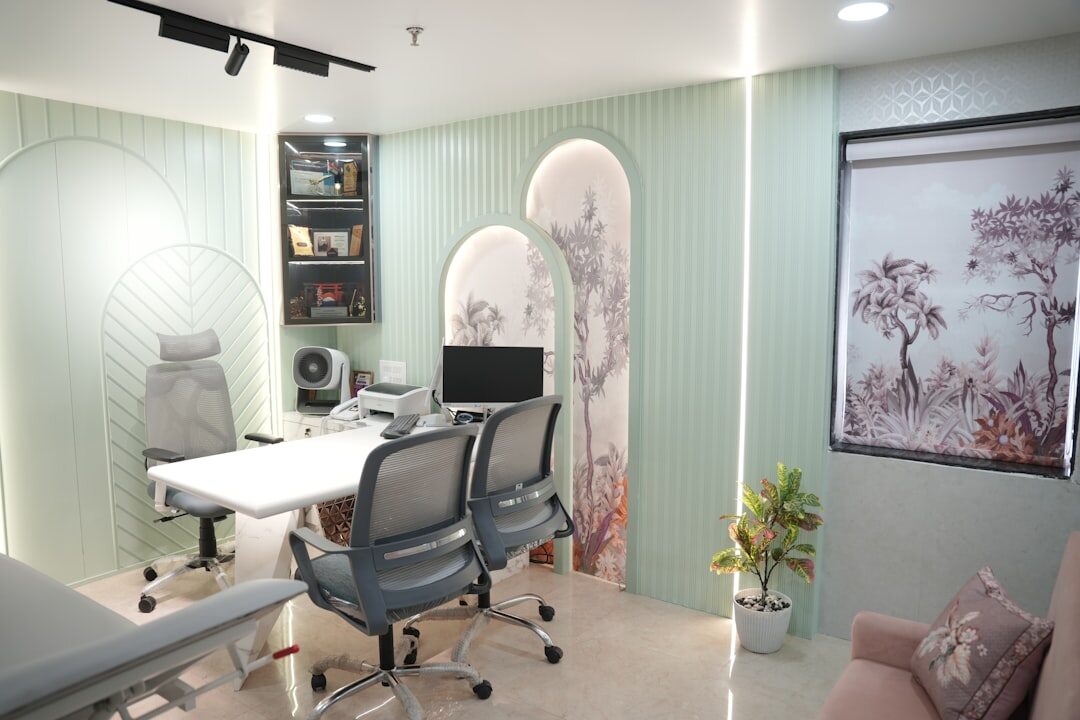 Modern welcoming office reception area with plants and seating