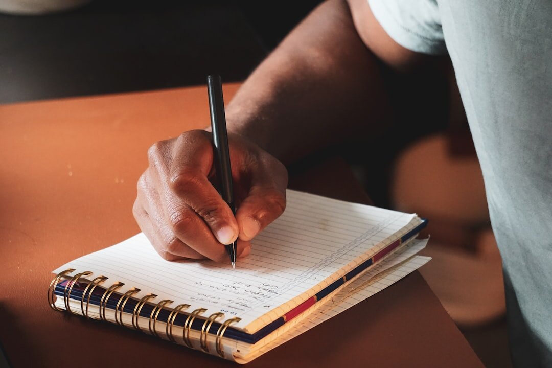 person writing notes